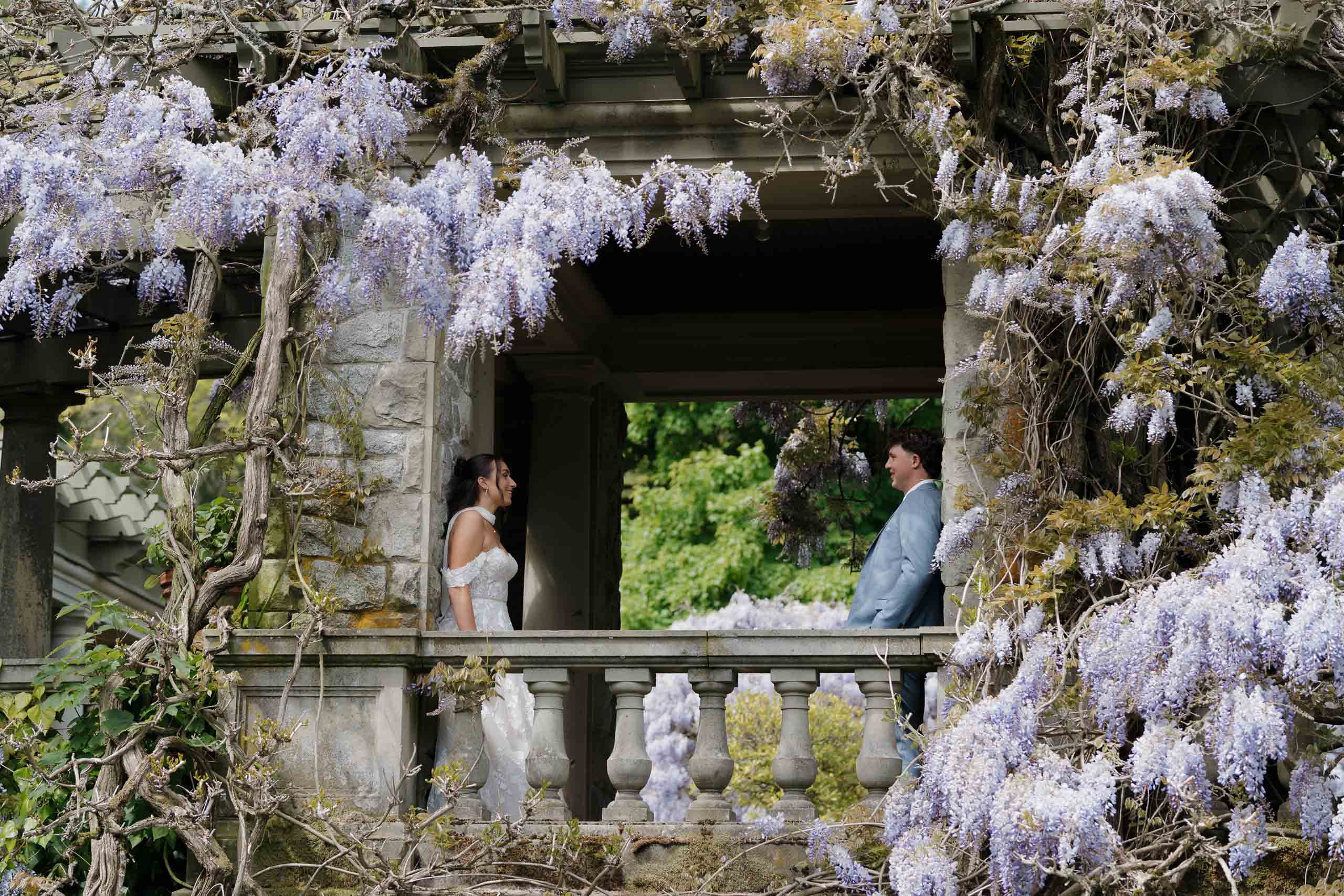 Couple running in the grass at Hatley Caslte - local Victoria BC Wedding Photographer captures wedding photos at Hatley Castle Wedding in BC