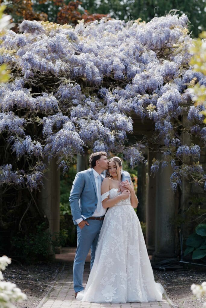 Couple running in the grass at Hatley Caslte - local Victoria BC Wedding Photographer captures wedding photos at Hatley Castle Wedding in BC