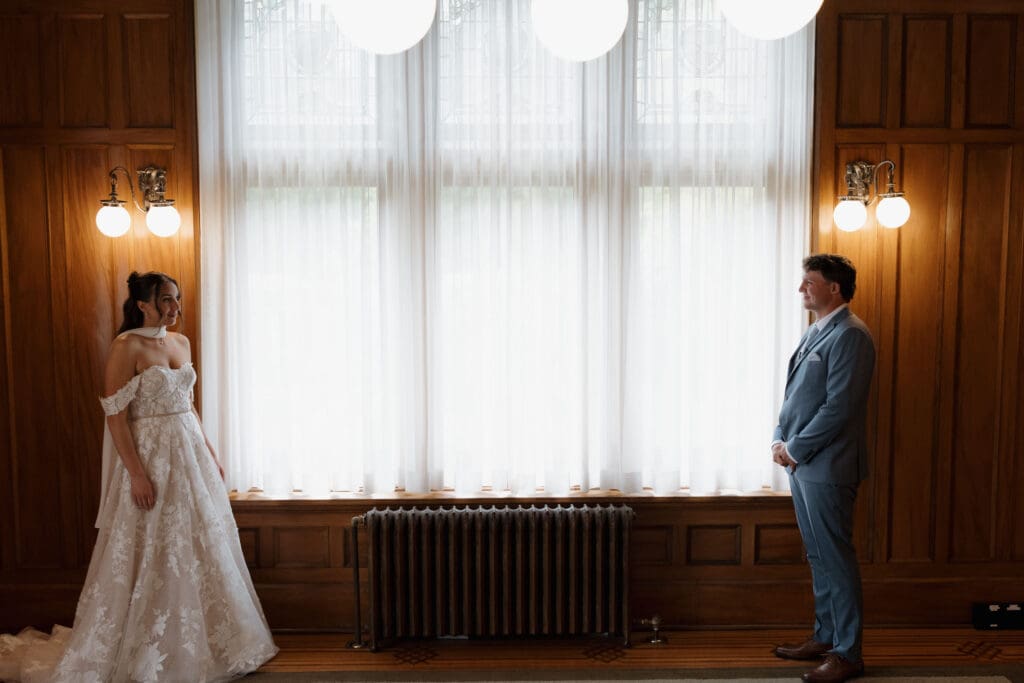 Hatley Castle Wedding in Victoria BC captured by local Wedding Photographer Hayley Zumkeller - Intimate, Elegant, Castle Wedding Bride and Groom first look inside Hatley Castle