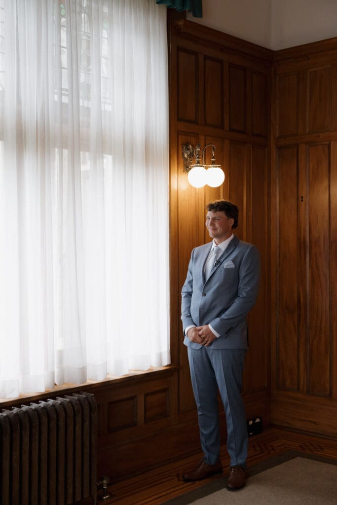 Hatley Castle Wedding in Victoria BC captured by local Wedding Photographer Hayley Zumkeller - Intimate, Elegant, Castle Wedding Bride and Groom first look inside Hatley Castle