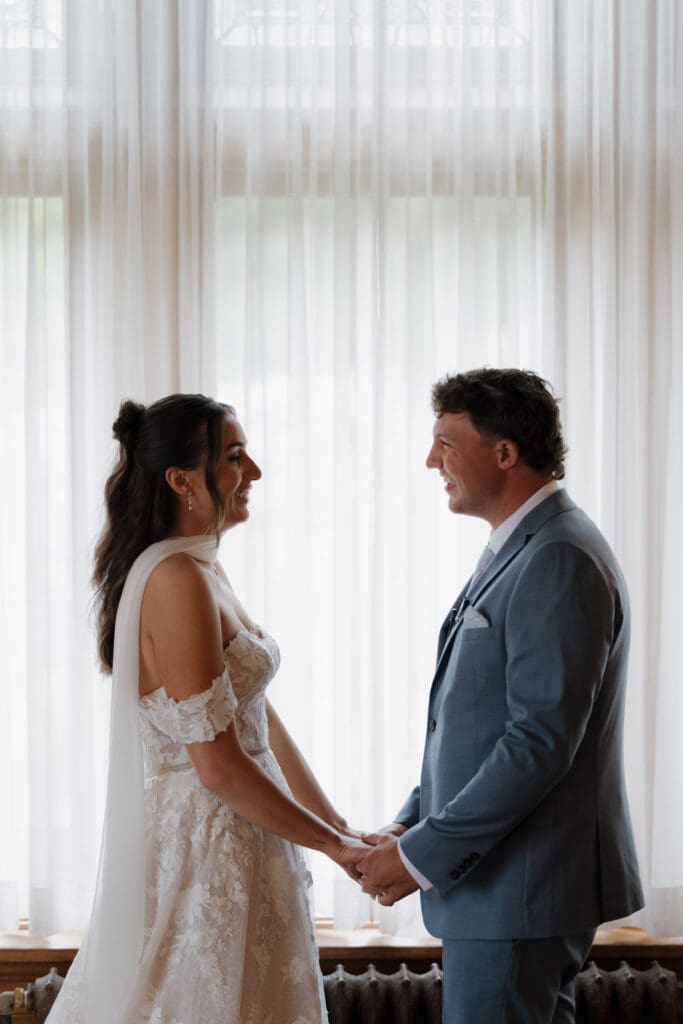 Hatley Castle Wedding in Victoria BC captured by local Wedding Photographer Hayley Zumkeller - Intimate, Elegant, Castle Wedding Bride and Groom first look inside Hatley Castle