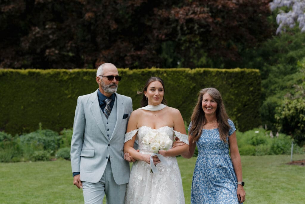 Hatley Castle Wedding in Victoria BC captured by local Wedding Photographer Hayley Zumkeller - Intimate, Elegant, Wedding Ceremony on the grass below the italian gardens