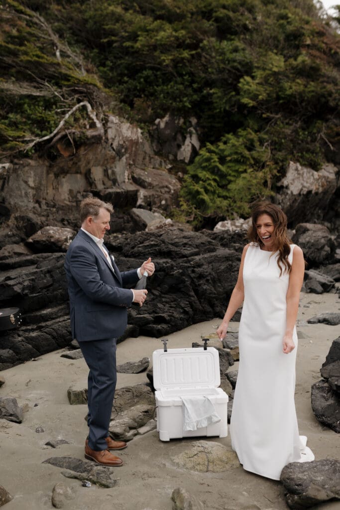 Chesterman Beach Wedding Ceremony comes to an end, and the bride and groom take wedding portraits Photographer captures moments on both photo and video