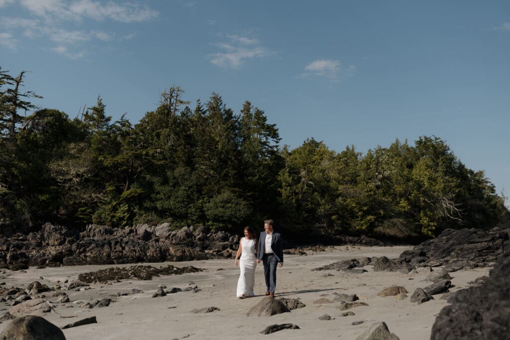 Tofino BC Wedding Photographer and Videographer captures bride and groom after their wedding ceremony at Crystal Cove Resort on Chesterman Beach
