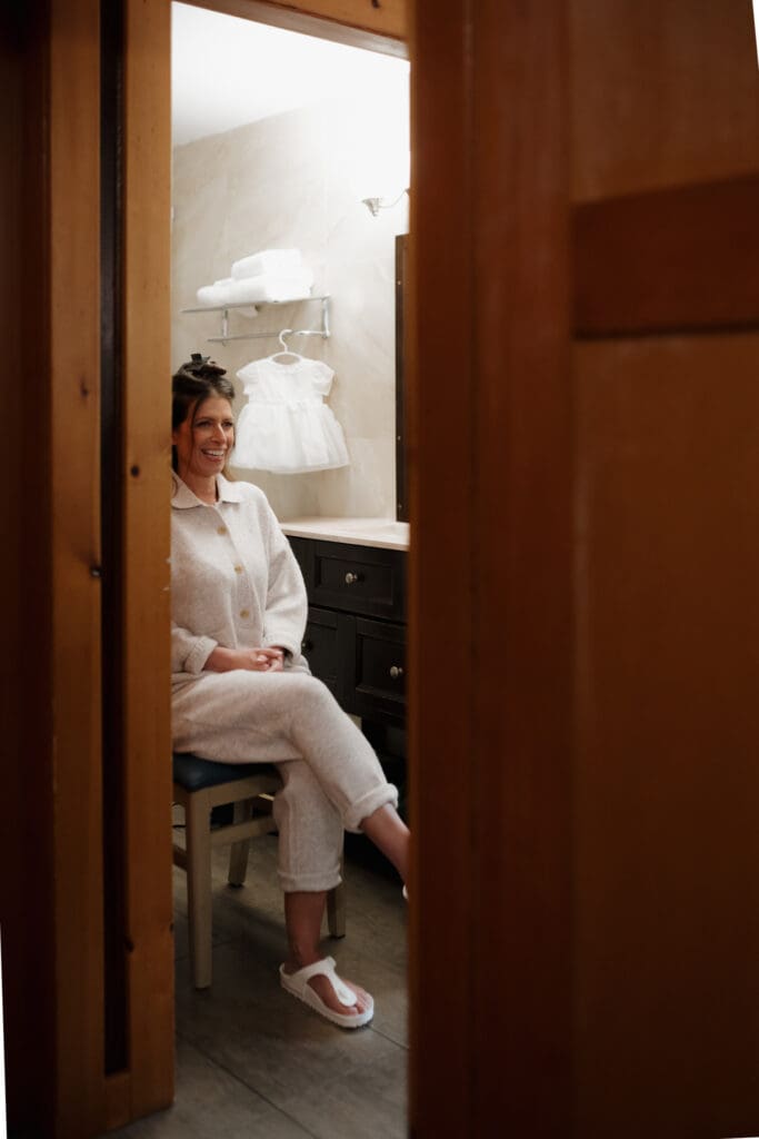 Hayley Zumkeller photography and videography team capture a bride pre-elopement ceremony having her hair done for the big day on Vancouver Island.