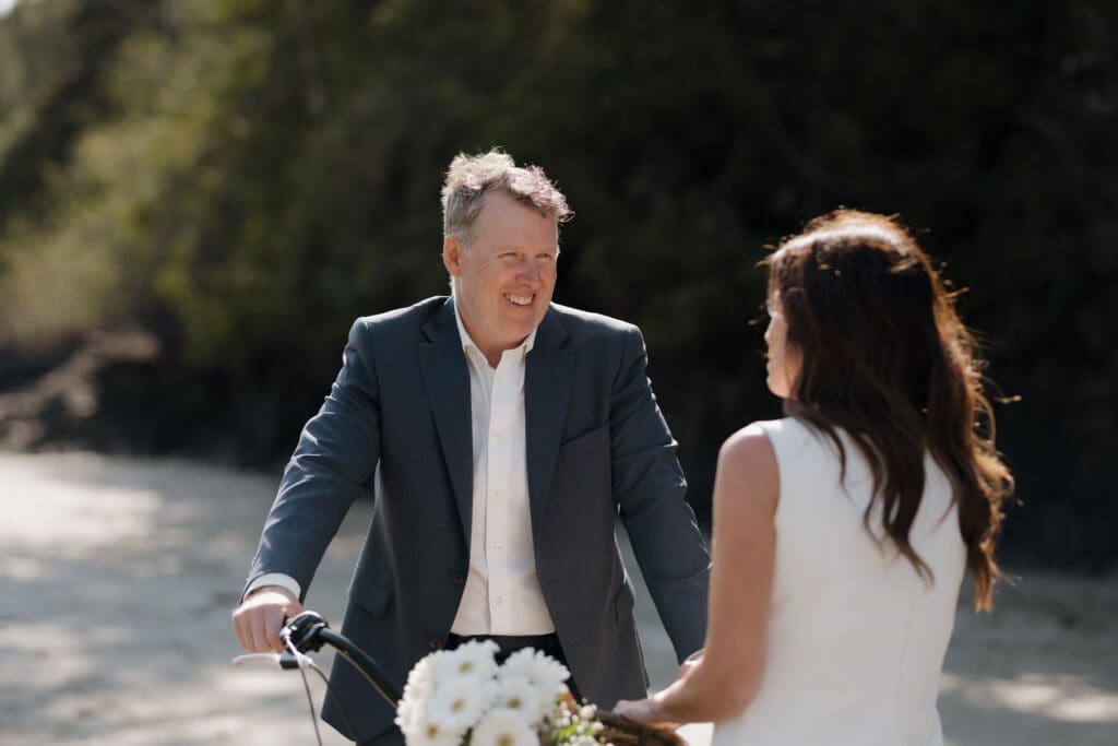Tofino BC Wedding Photographer and Videographer captures bride and groom after their wedding ceremony at Crystal Cove Resort on Chesterman Beach