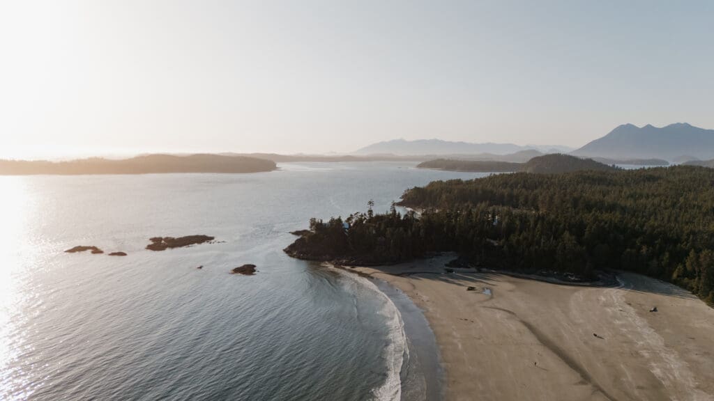 Tofino BC Wedding Photographer and Videographer captures drone footage of  Chesterman Beach. Sunset Wedding Photogrpahy at Golden Hour in Tofino
