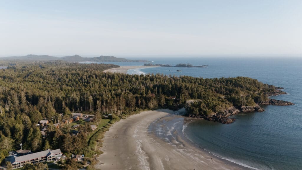 Tofino BC Wedding Photographer and Videographer captures bride and groom, and their family on Chesterman Beach. Sunset Wedding Photogrpahy at Chesterman Beach with the Bride and Groom at Golden Hour in Tofino