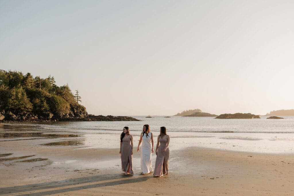 Tofino BC Wedding Photographer and Videographer captures bride and groom, and their family on Chesterman Beach. Sunset Wedding Photogrpahy at Chesterman Beach with the Bride and Groom at Golden Hour in Tofino