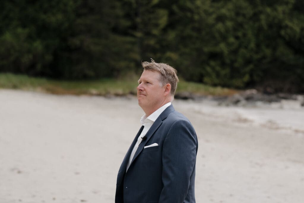 Bride and Groom first look before Wedding Ceremony at Crystal Cove Beach Resort at Chesterman Beach. Local Tofino BC Wedding Photographer captures moments on both photo and video