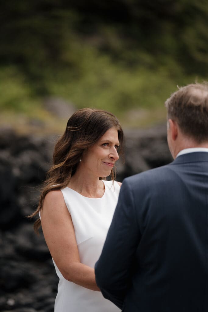 Bride and Groom first look before Wedding Ceremony at Crystal Cove Beach Resort at Chesterman Beach. Local Tofino BC Wedding Photographer captures moments on both photo and video