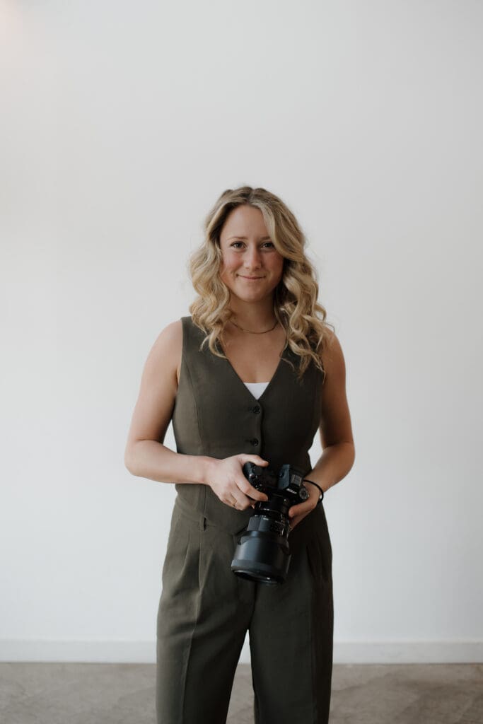 Hayley Zumkeller, lead photographer of Hayley Zumkeller photography and videography team in Victoria BC, poses for her headshot to share more of her fun personality.