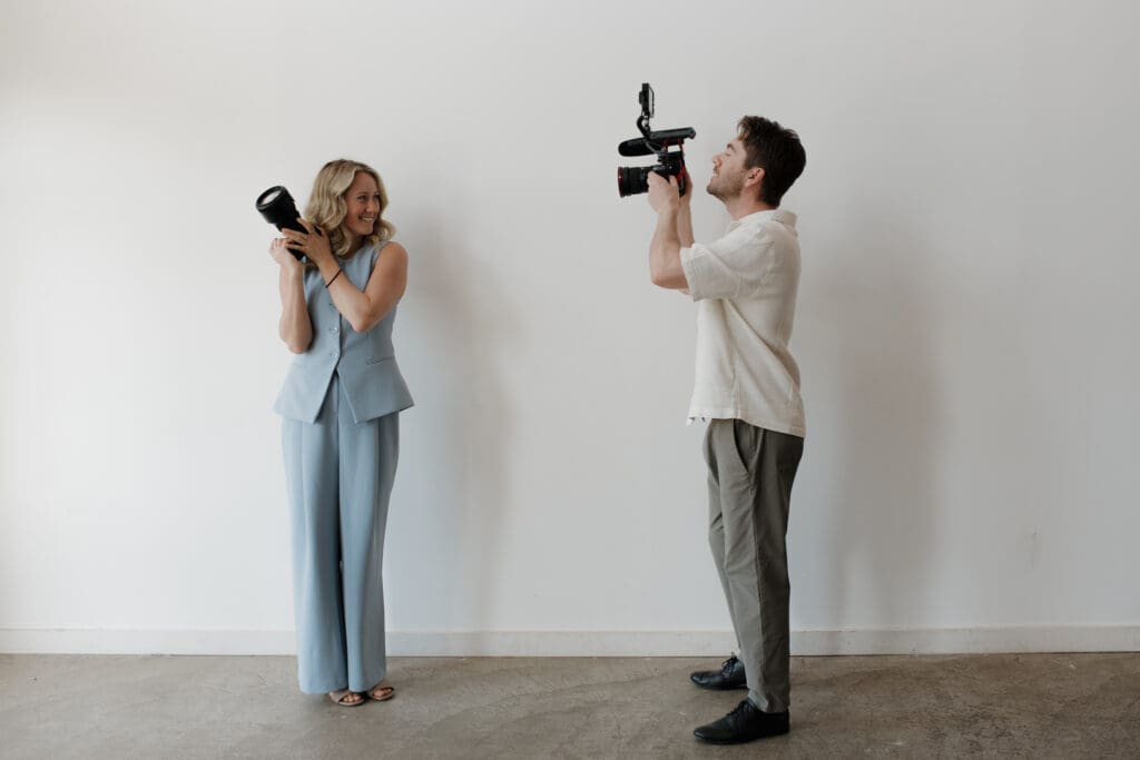 Hayley Zumkeller photography and videography team from Victoria BC pose for the camera to connect with couples looking for professional wedding photography or videography on Vancouver Island.