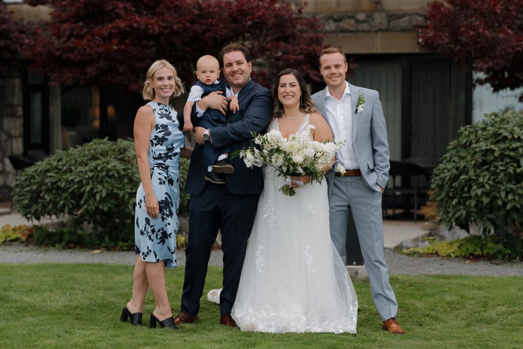 Hayley Zumkeller Victoria BC Wedding Photographer captures image of a bride and groom with their siblings and nephew at a Oak Bay Beach Hotel Wedding in Victoria BC.