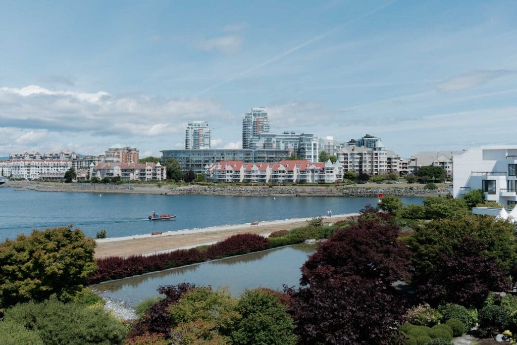 Hayley Zumkeller Photography and Videography team capture the Laurel Point Inn harvour view that is the backdrop of an elegant, fun wedding ceremony in Victoria BC