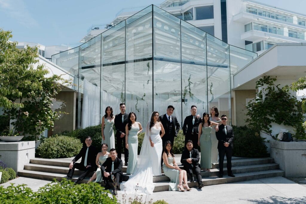 Hayley Zumkeller, Victoria BC Wedding Videographer and Photographer captures the full wedding party during this fun, elegant mini-destination wedding at Laurel Point Inn on Vancouver Island.
