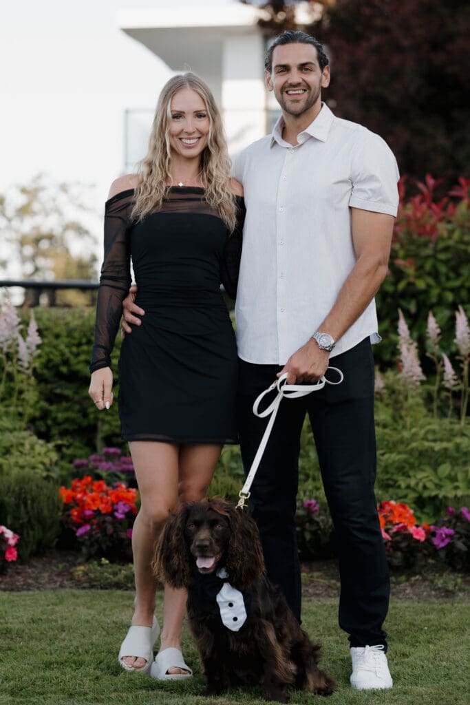what to wear to your engagement photoshoot, couple is in a black dress and a nice white shirt, smiling at the camera