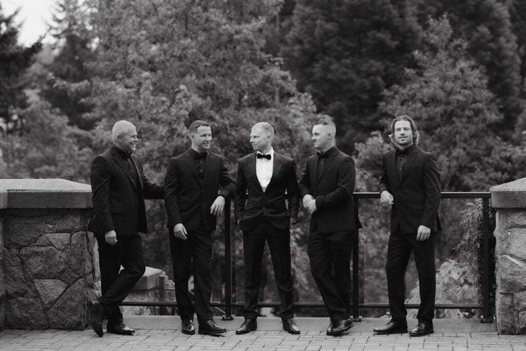 Hayley Zumkeller photography and videography team from Victoria BC capture the groom with his groomsman in their tuxedos prior to the ceremony.