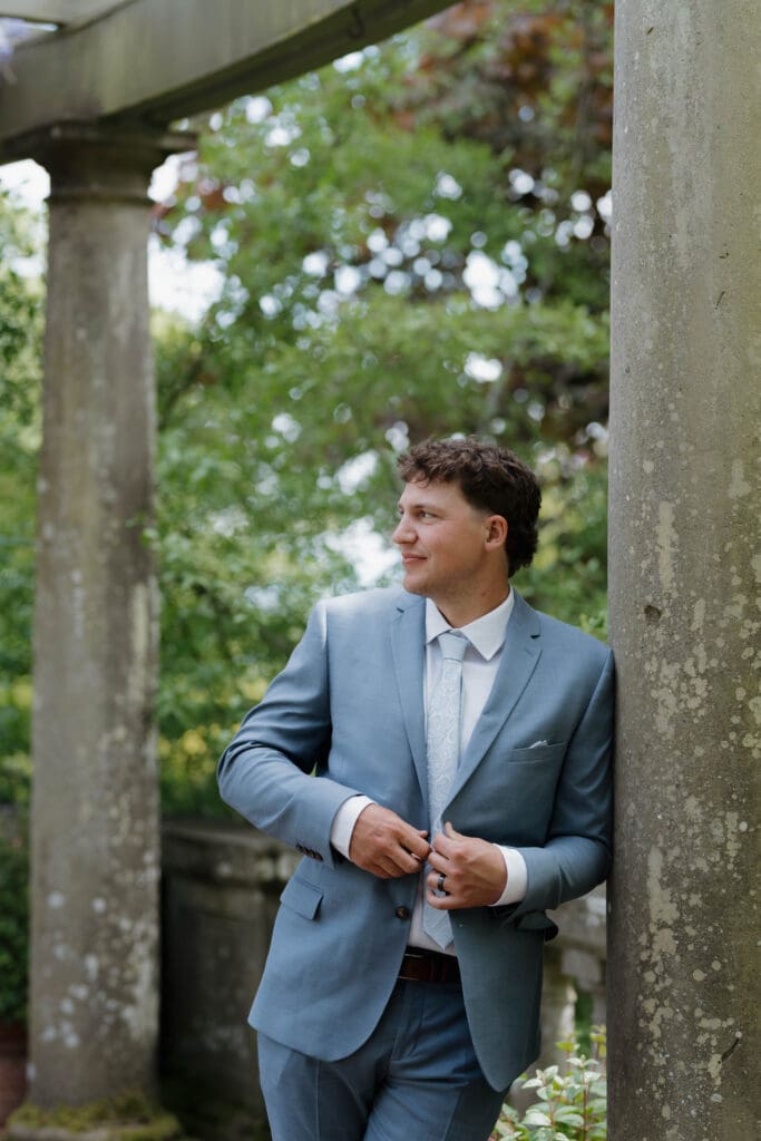 A handsome groom in his tuxedo getting ready for his wedding day in Victoria BC. Image captured by Hayley Zumkeller photography and videography.