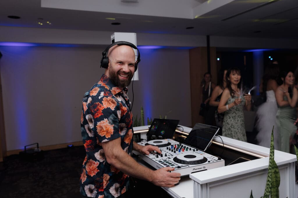 This image of a DJ at a Vancouver Island wedding was captured by Hayley Zumkeller photography and videography team from Victoria BC.