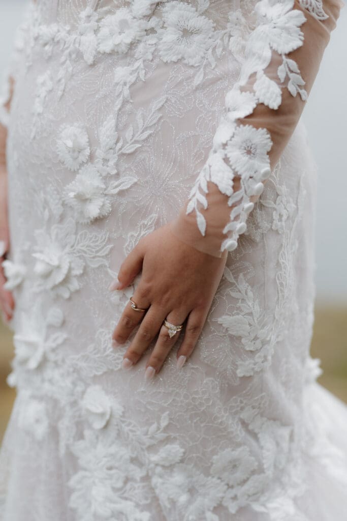 This image captures the intricate detail of a bride's wedding gown taken on Vancouver Island by Wedding photographer and videographer Hayley Zumkeller from Victoria BC.