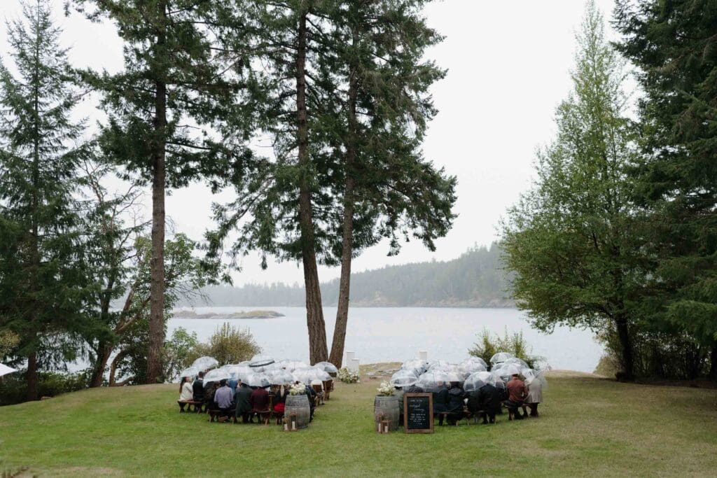Victoria BC photography and videography team capture the ceremony arrangement at an oceanside venue.