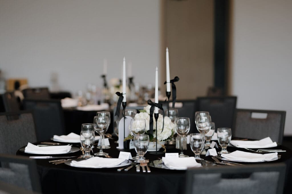 Hayley Zumkeller photography and videography team from Victoria BC capture the Olympic View table set up for a wedding dinner, highlighting the work of the venue team and wedding planner.