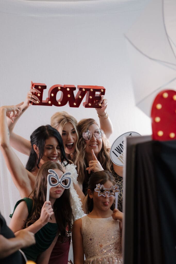 Hayley Zumkeller photography and videography team from Victoria BC capture the fun party accessories available for rent to make your wedding reception epic.