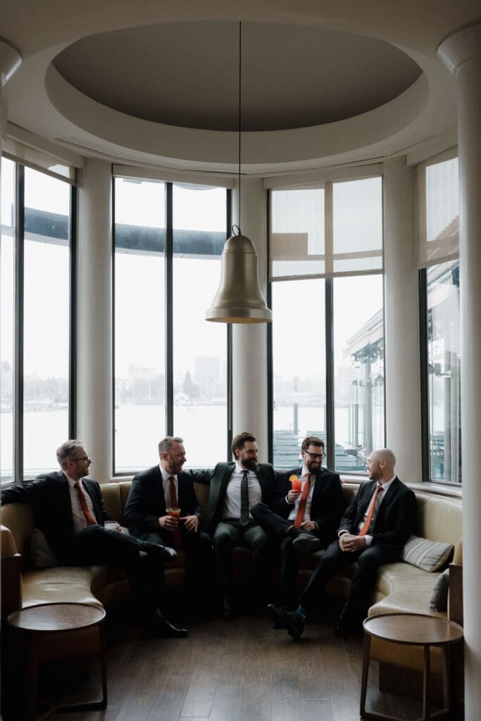 Hayley Zumkeller photography and videography team from Victoria BC capture the groom with his groomsman prior to the wedding ceremony at Church and State Winery.