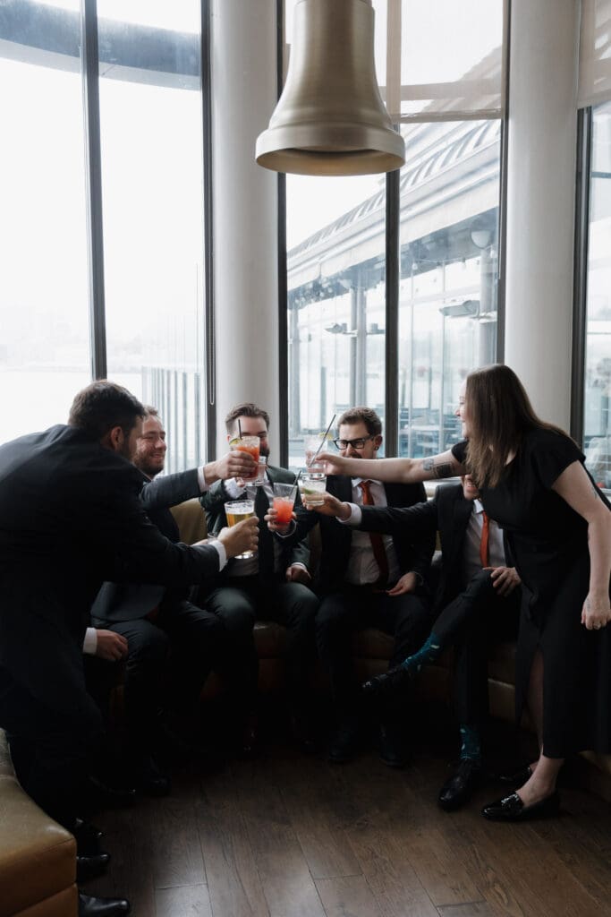 Hayley Zumkeller photography and videography team from Victoria BC capture the groom with his groomsman prior to the wedding ceremony at Church and State Winery.