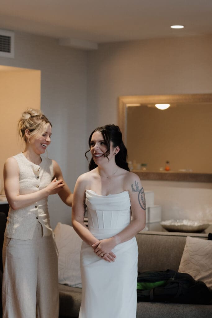 Hayley Zumkeller photography and videography team from Victoria BC capture a bride getting ready at Delta Ocean Pointe on Vancouver Island prior to her wedding ceremony at Church and State Winery.