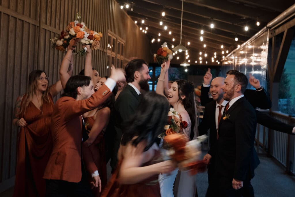 Hayley Zumkeller photography and videography team from Victoria BC capture the fun filled reception with everyone dancing at this Church and State Winery wedding on Vancouver Island.