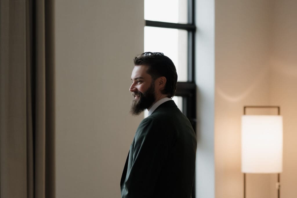 Hayley Zumkeller photography and videography team from Victoria BC captures a groom just prior to his first look with his waiting bride at Delta Ocean Pointe on Vancouver Island.