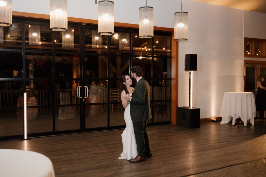 Wedding reception dance floor at Church and State Winery Victoria BC captured by wedding videography team Hayley Zumkeller