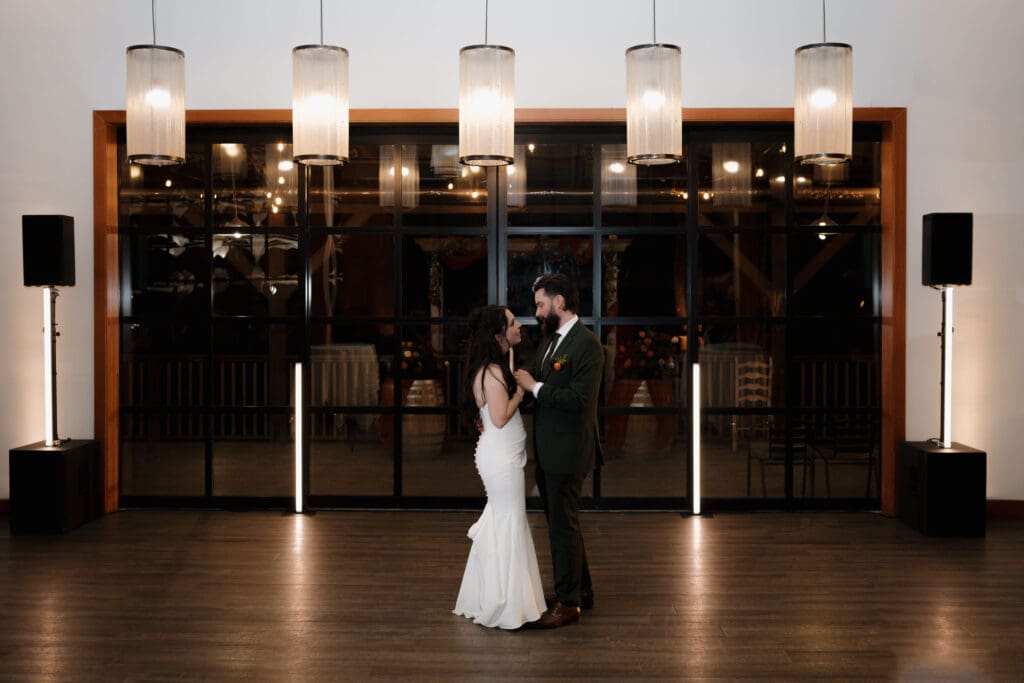 Wedding reception dance floor at Church and State Winery Victoria BC captured by wedding videography team Hayley Zumkeller