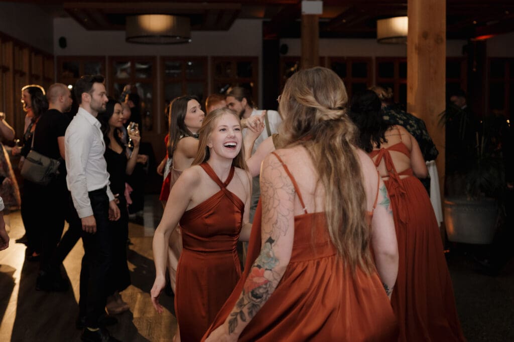 Wedding reception dance floor at Church and State Winery Victoria BC captured by wedding videography team Hayley Zumkeller