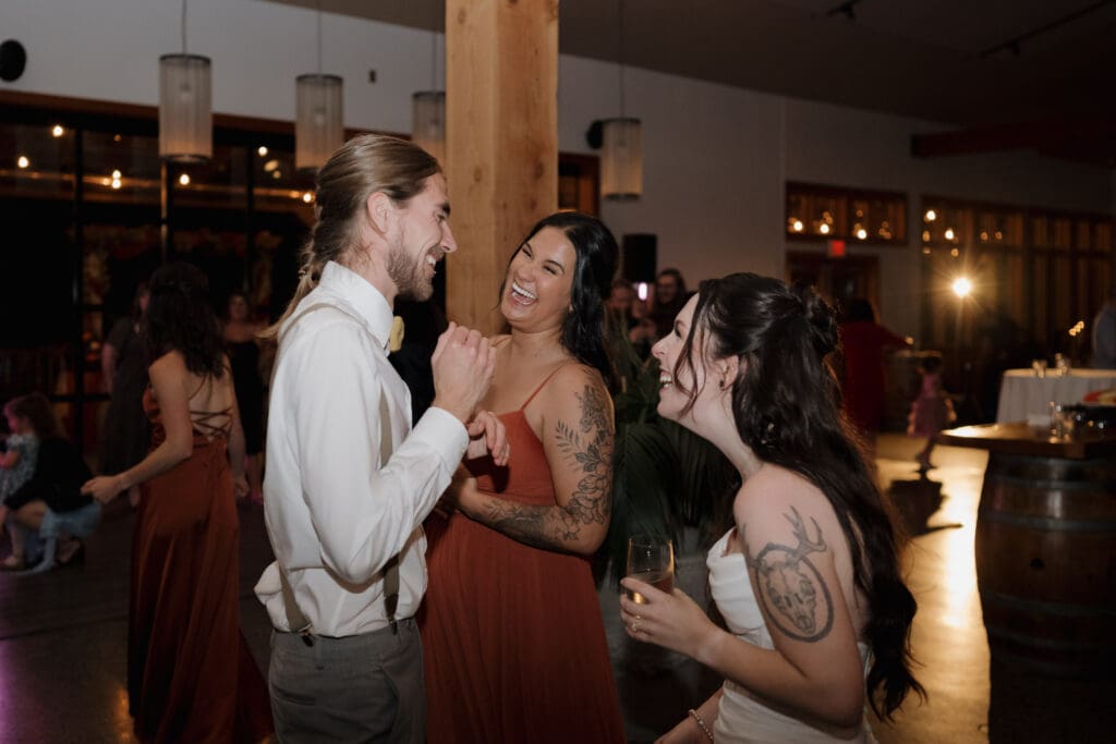 Wedding reception dance floor at Church and State Winery Victoria BC captured by wedding videography team Hayley Zumkeller