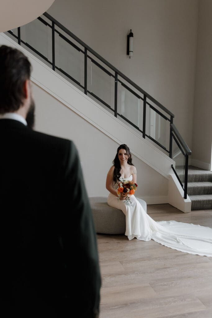 Hayley Zumkeller photography and videography team from Victoria BC capture a bride and groom during their first look at Delta Ocean Pointe on Vancouver Island.