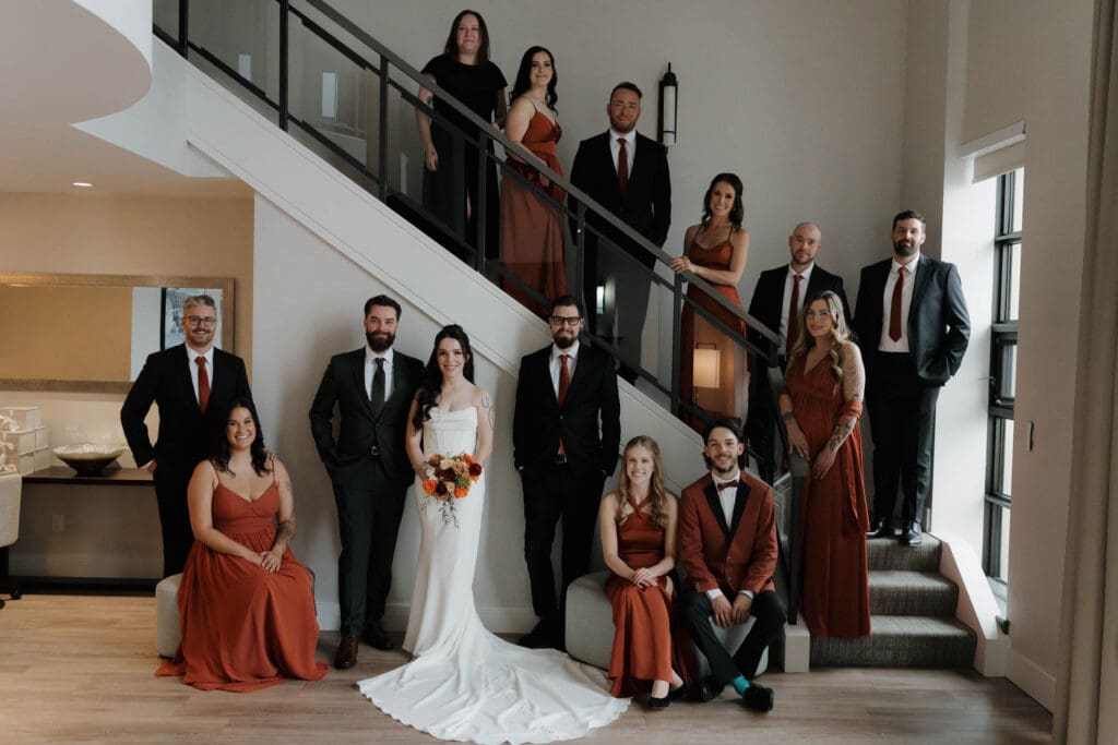 Hayley Zumkeller photography and videography team from Victoria BC captures the full bridal party following the emotional first look at Delta Ocean Pointe on Vancouver Island.