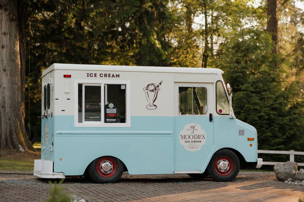 Hayley Zumkeller photography and videography team from Victoria BC capture the ice cream truck at a Nanaimo outdoor wedding on Vancouver Island. The bride and groom made thoughtful and fun choices for their elegant wedding day.