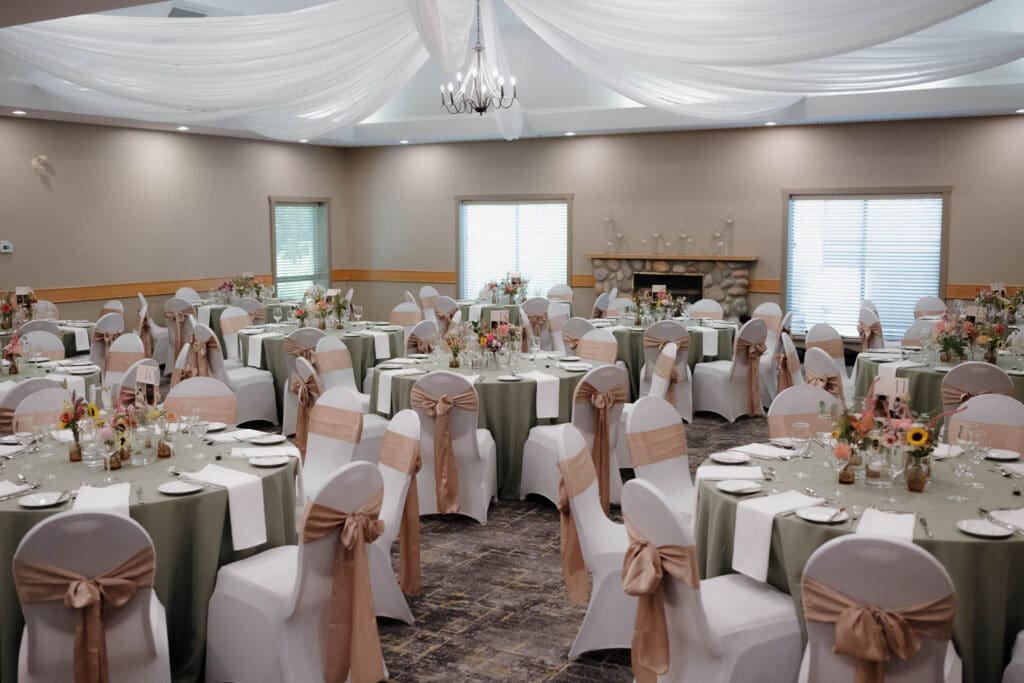 A reception set up at Tigh-Na-Mara on Vancouver Island. Image captured by Hayley Zumkeller photography and videography team from Victoria BC showcases the luxurious linens and neutral colour arrangements of the event space.