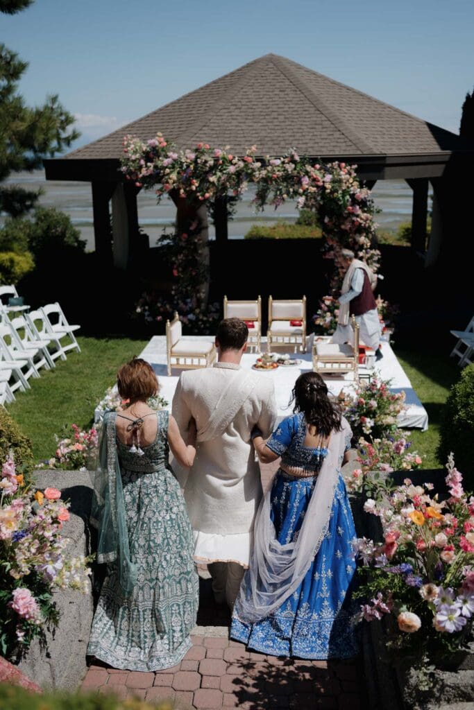 This traditional Indian wedding ceremony set up at Tigh-Na-Mara was captured by Hayley Zumkeller photography and videography team from Victoria BC. With oceanside views in the backdrop and gorgeous floral arrangements all around, Tigh-Na-Mara is a perfect venue to have a wedding filled with family and connection.