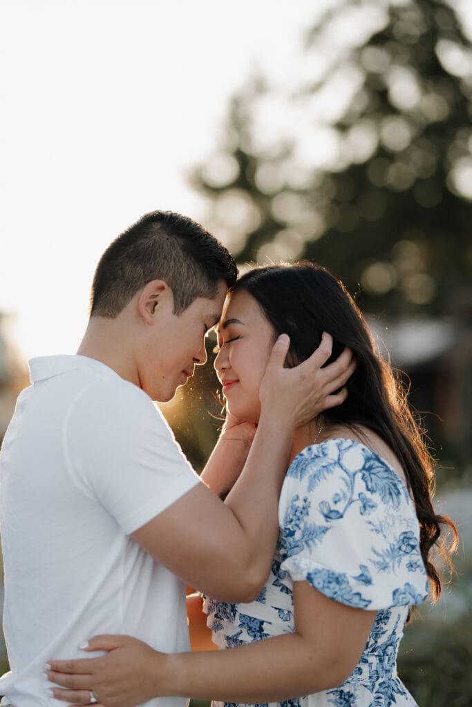 Romantic close-up of a couple during their Saratoga Beach golden hour engagement photoshoot on Vancouver Island.