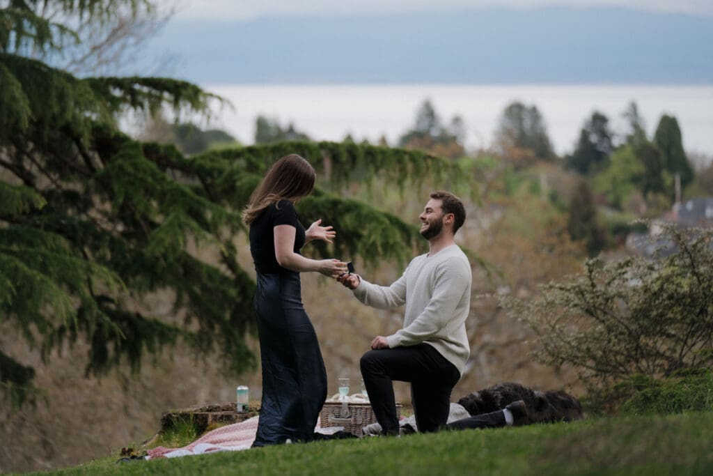 Victoria BC Surprise Proposal photographer captures the moment a man kneels to propose to his girlfriend at Government House
