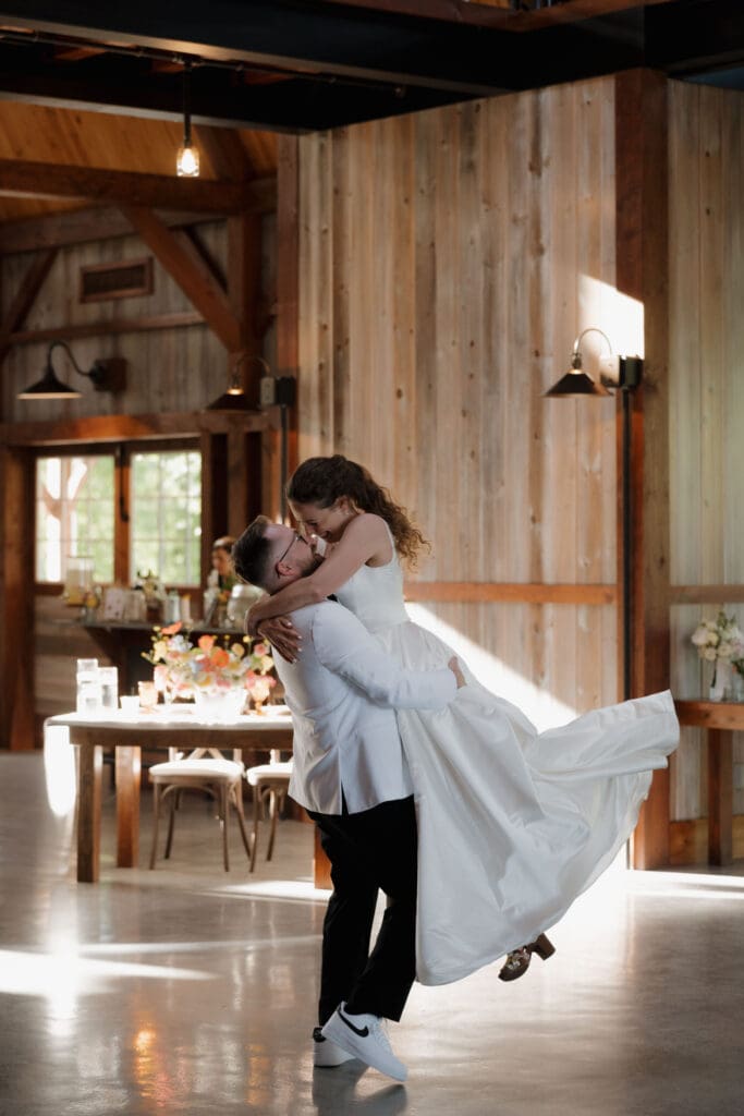 A husband and wife share their first dance during their reception at Wildflower on Watts in Honesdale PA.