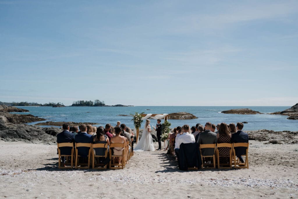 Aerial view of a private beach wedding ceremony at the Wickaninnish Inn Tofino