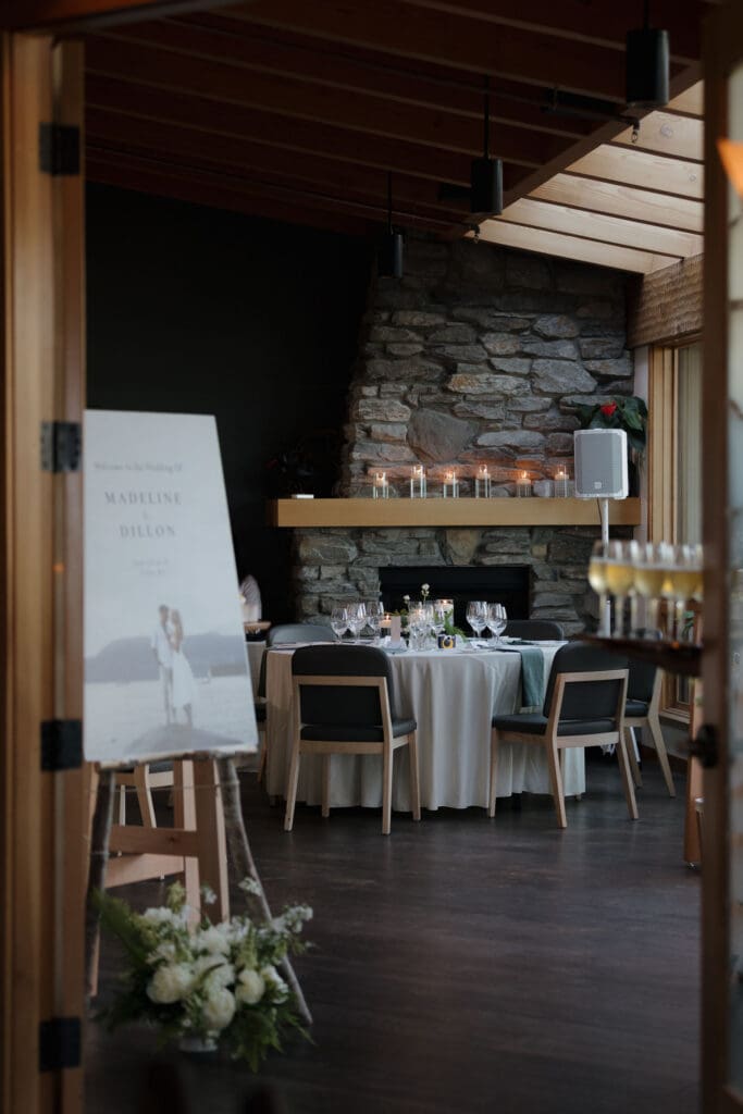 Wedding reception tables and white floral arrangements at the Wickaninnish Inn in Tofino