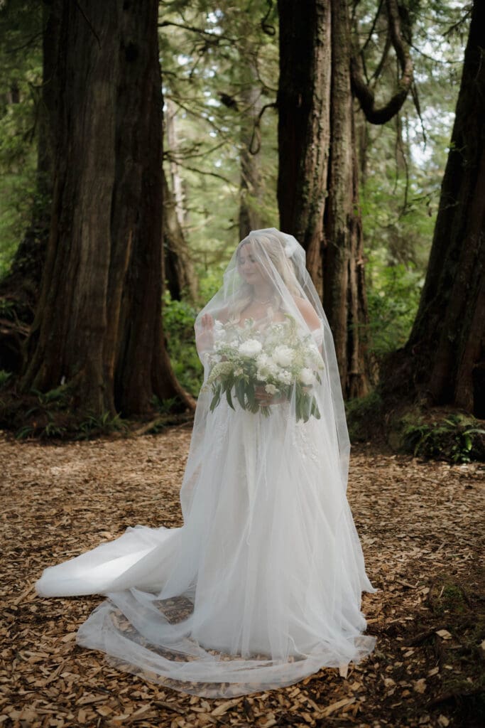 August wedding photos in Tofino BC by a Tofino wedding photographer at the Wickanninish hidden forest