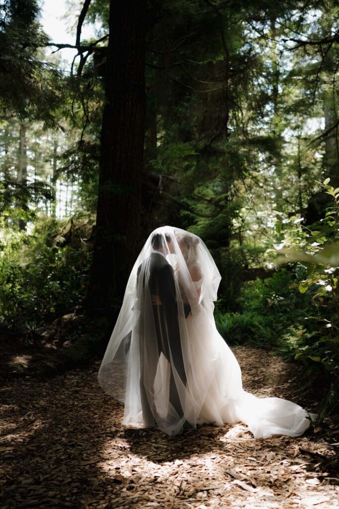 August wedding photos in Tofino BC by a Tofino wedding photographer at the Wickanninish hidden forest