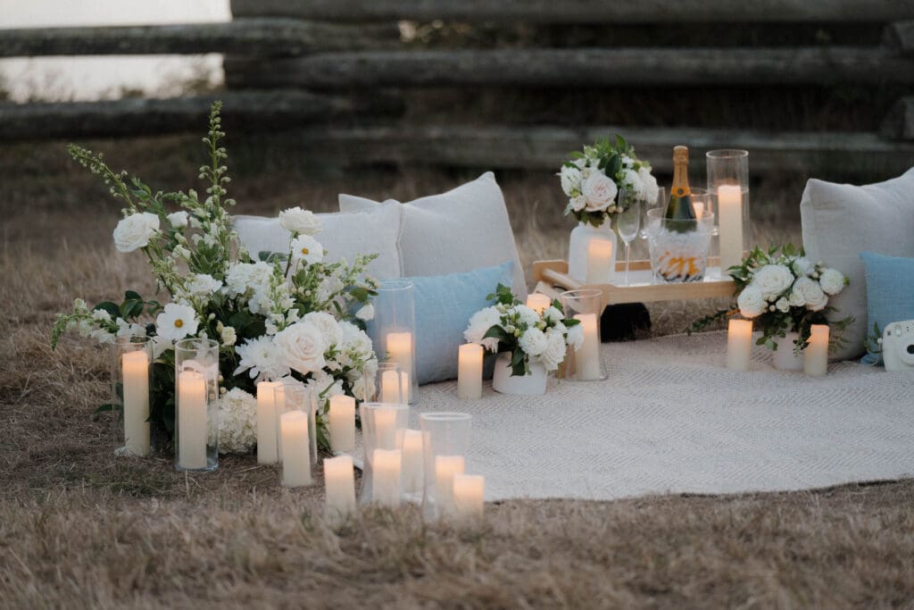 Candles and florals arranged for a private evening proposal in Victoria BC
